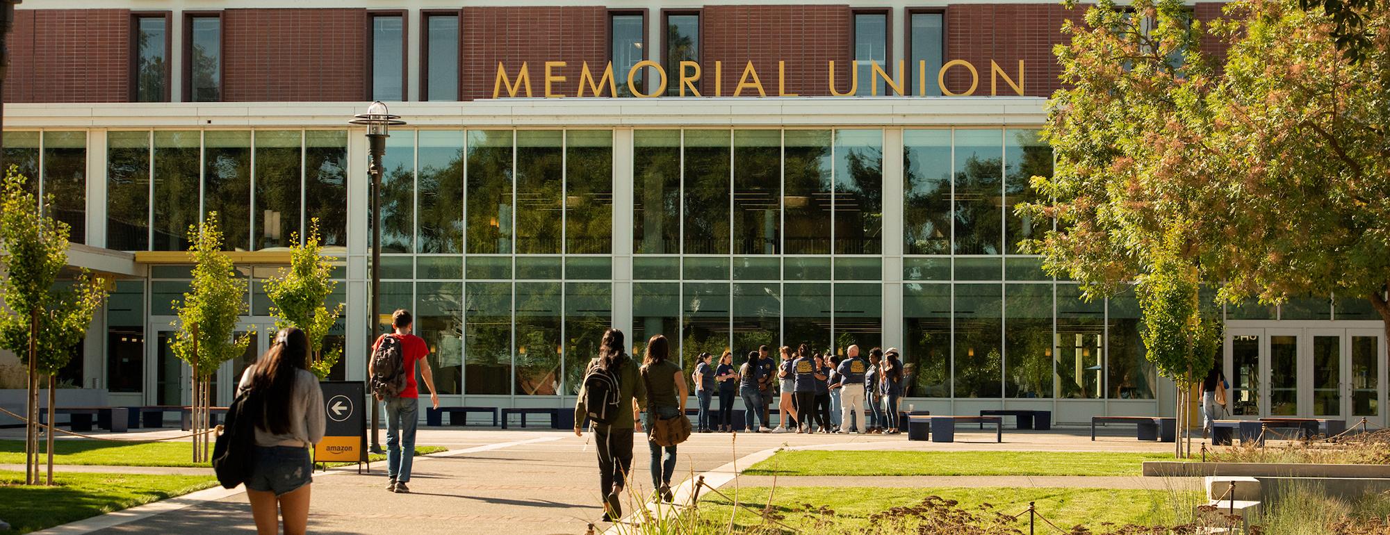 students walking in front of Memorial Union building